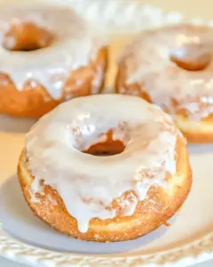 Baked Cinnamon Bun Donuts with Vanilla Cream Cheese Glaze