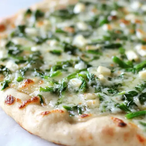 Brie and Garlic Scape Pizza