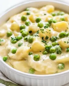 Cheesy Creamed Peas and Potatoes