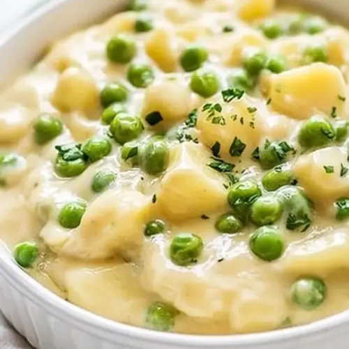 Cheesy Creamed Peas and Potatoes