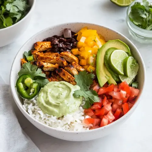 Chipotle Chicken Burrito Bowl with Avocado Lime Crema