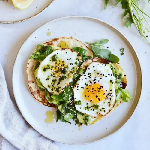 Crispy Egg Tostadas with Lemon Greens and Toasted Sesame Oil