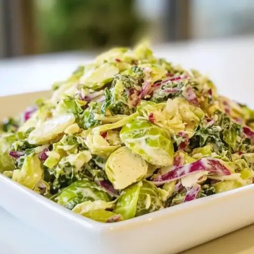Crunchy Kale and Brussels Sprout Salad with Creamy Dijon Dressing