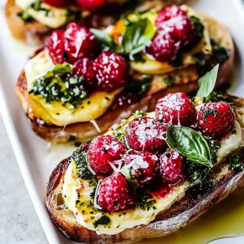 Honey Raspberry Brie Crostini with Basil Oil
