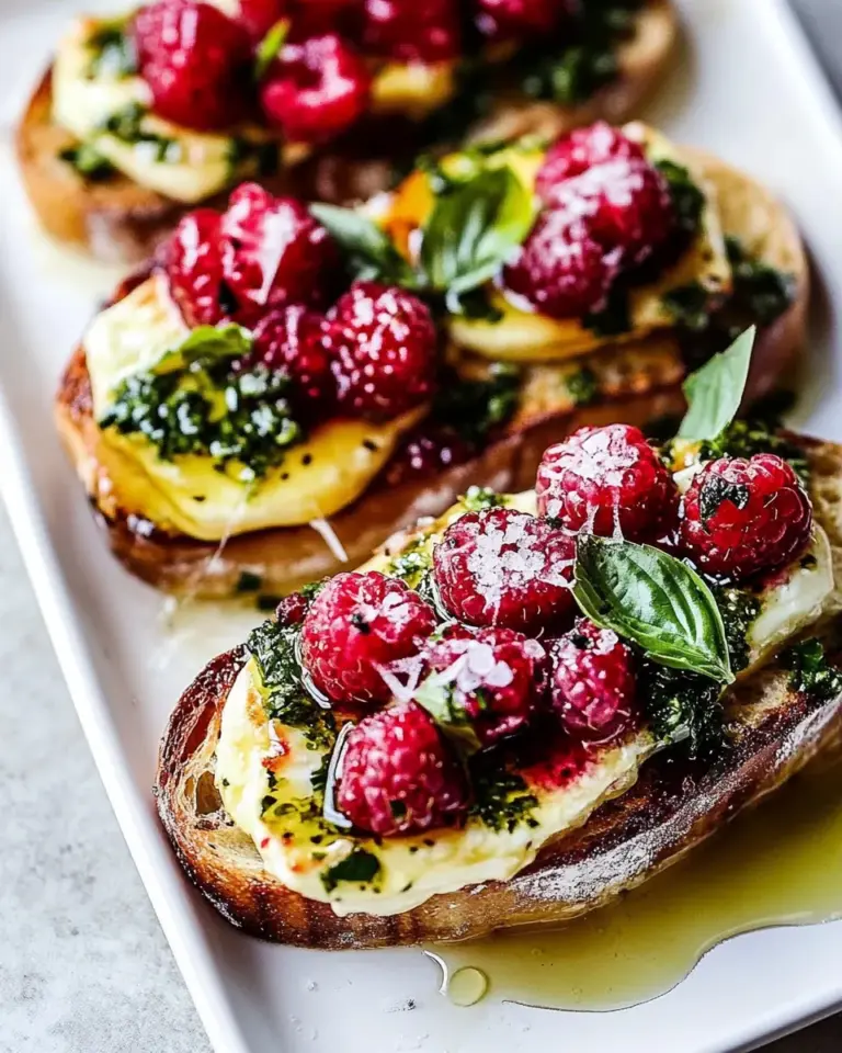 Honey Raspberry Brie Crostini with Basil Oil