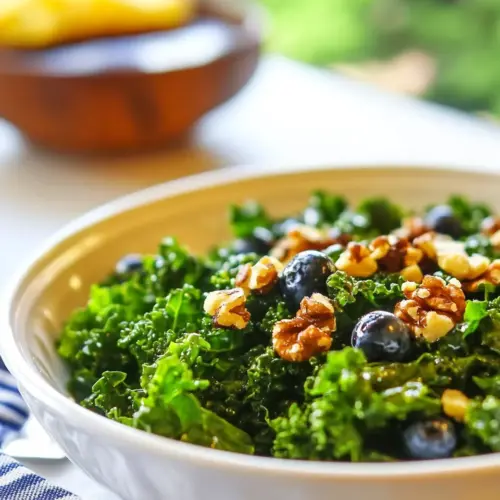 Massaged Kale Salad with Rosemary Walnuts and Blueberry Vinaigrette