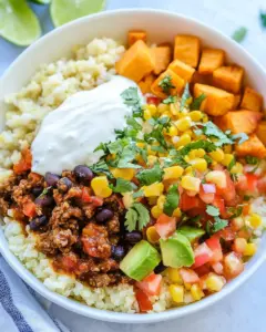 Riced Cauliflower and Sweet Potato Beef Burrito Bowls