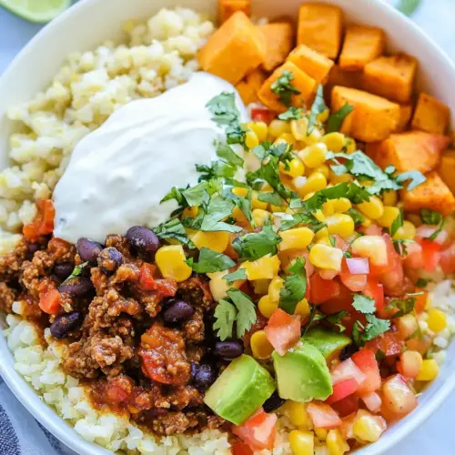 Riced Cauliflower and Sweet Potato Beef Burrito Bowls