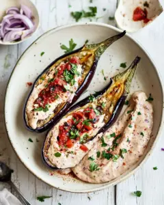Roasted aubergines with harissa yoghurt