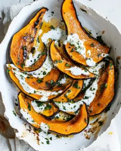 Roasted pumpkin with chilli yoghurt and coriander sauce