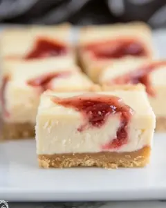 Strawberry Swirl Cheesecake Bars
