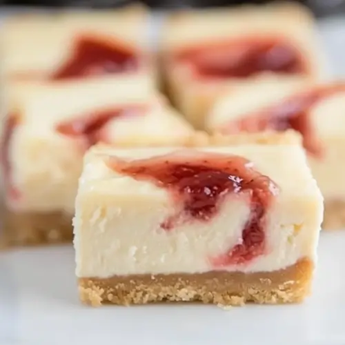 Strawberry Swirl Cheesecake Bars